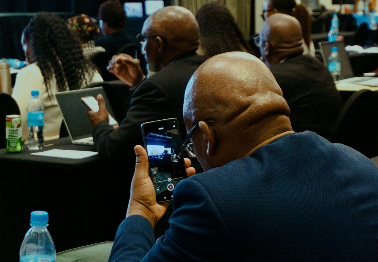 Conference attendees during a speaker session